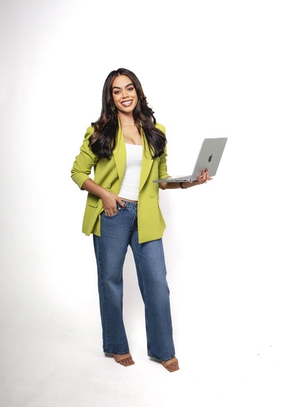 Veronica smiling with her laptop