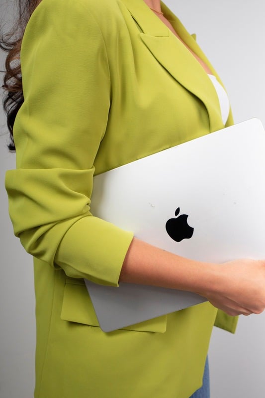 Veronica holding a laptop